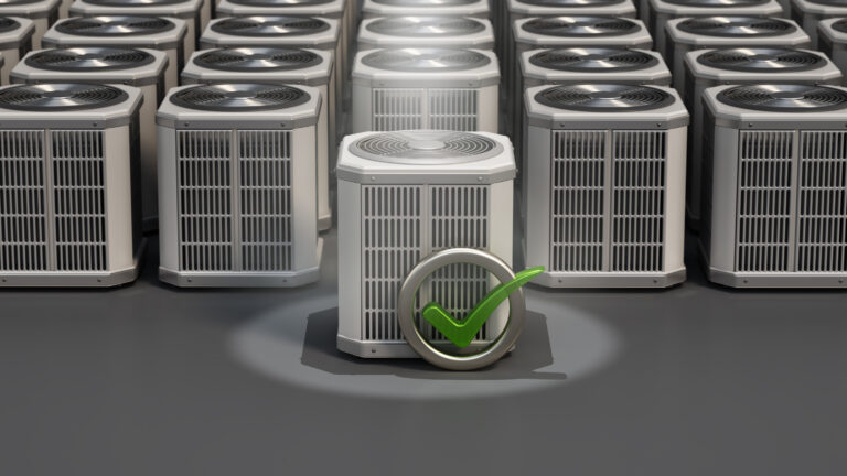 Spot lit heat pump unit with check mark symbol standing out from the rest